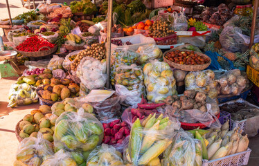Tropical fruits and vegetables on local street market in Cambodia