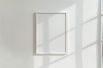 White rectangular vertical frame hanging on a white wall mockup. Clear design mock up template reflection, shadow overlay