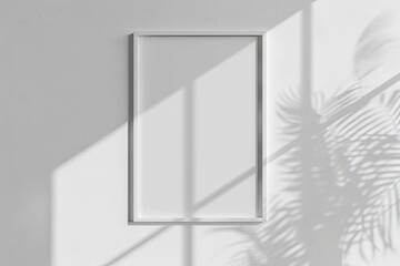 White rectangular vertical frame hanging on a white wall mockup. Clear design mock up template reflection, shadow overlay
