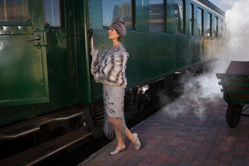 1920s woman on train platform