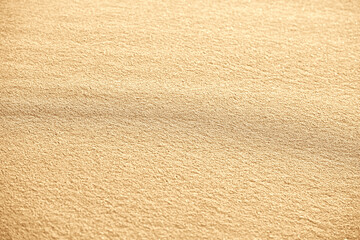 Beach sand background. Top view of a beach sand background