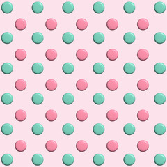 Cute colorful seamless pattern.3D polka dots in pink and green isolated on pink.Vector graphic repeat pattern.