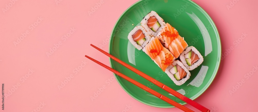 Leinwandbilder valentine s day themed sushi set on a green plate against a pink background ideal for food concepts 
