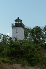 moon by lighthouse