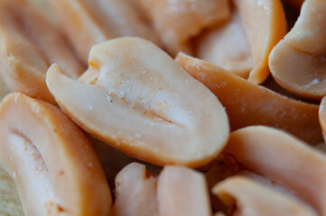 Close up view of fresh roasted peanuts. Healthy food concept