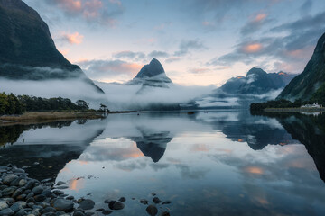 Milford Sound with Mitre peak and foggy on the lake at Fjordland national park, New Zealand