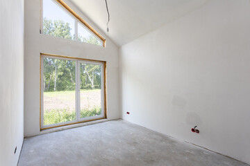 interior of the apartment without decoration in gray colors. rough finish