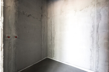 interior of the apartment without decoration in gray colors. rough finish