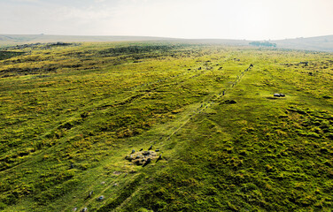 Merrivale Stone Rows, Dartmoor. Two double Neolithic avenues. From centre of the rows looking N.E. Cairn ring foreground. Cist capstone centre right