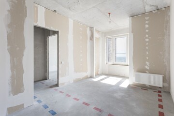interior of the apartment without decoration in gray colors. rough finish