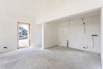 interior of the apartment without decoration in gray colors. rough finish