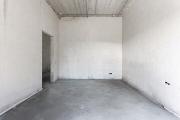 interior of the apartment without decoration in gray colors. rough finish