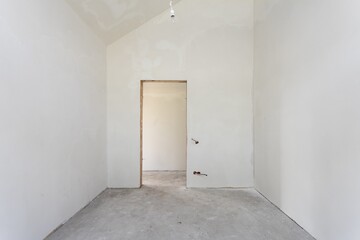 interior of the apartment without decoration in gray colors. rough finish
