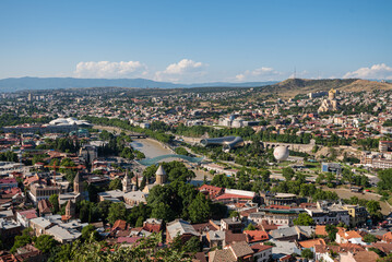 View from the observation deck from above on the Kura River and the sights of Tbilisi. The urban landscape. © GEMIMAGES