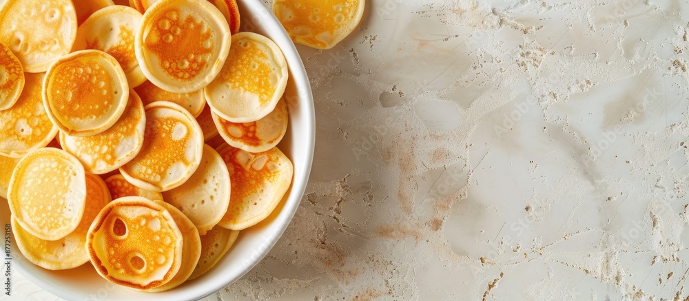 Poster top view background of mini pancakes a menu concept for sweet breakfast or dessert with space for te