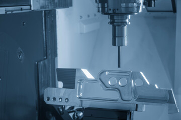 The 5-axis machining center cutting aerospace parts with solid ball end mill tool.