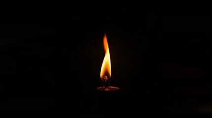 Flame on a dark background.