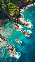 A beautiful aerial view of the ocean and cliffs.