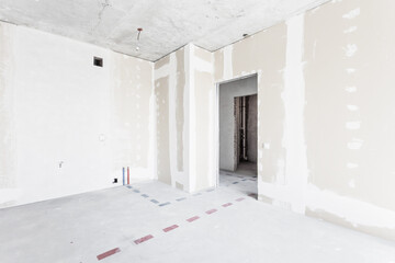 interior of the apartment without decoration in gray colors. rough finish