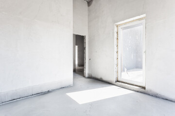 interior of the apartment without decoration in gray colors. rough finish