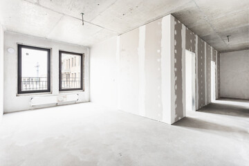 interior of the apartment without decoration in gray colors. rough finish