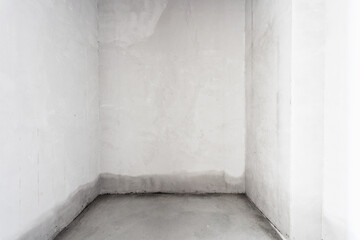 interior of the apartment without decoration in gray colors. rough finish