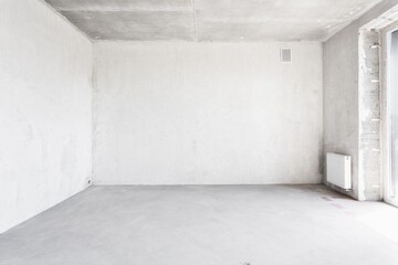 interior of the apartment without decoration in gray colors. rough finish