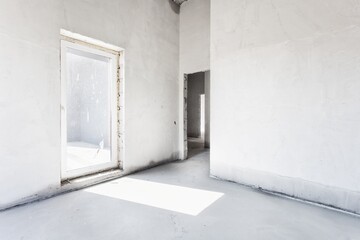 interior of the apartment without decoration in gray colors. rough finish