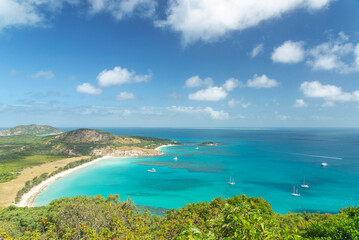 Picturesque tropical sandy Watsons Beach with turquoise water on Lizard Island, Australia. Lizard Island  is located on Great Barrier Reef in north-east part of Queensland.