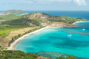 Fototapeta premium Picturesque tropical sandy Watsons Beach with turquoise water on Lizard Island, Australia. Lizard Island &nbsp;is located on Great Barrier Reef in north-east part of Queensland.