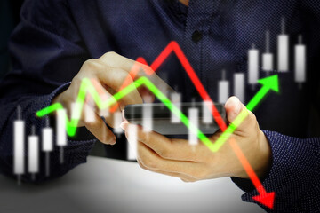 Businessman hand holding mobile showing digital virtual. Business success, hologram business glowing and future technology.