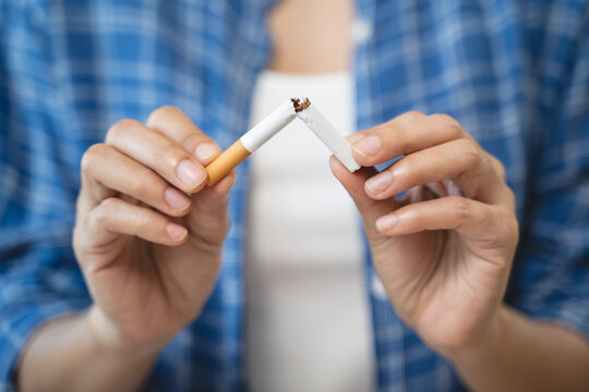 person showing hand sign to rejection cigarette for quit smoke motivation.