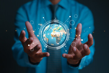 businessman holding Global network connection. Big data analytics and business intelligence concept. World map point and line composition concept of global business. Digital link tech.