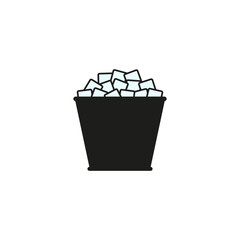 Bucket icon with ice cubes. Vector silhouette on a white background.