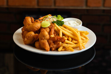 Plate of fish (shrimp) and chips with sides