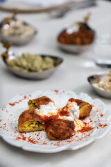 Spicy appetizer. Traditional Turkish and Arabic cuisine meze. Snack meal served alongside the main course. Natural vegetarian food. Bulk appetizer plates.. mezeler