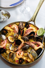 Traditional seafood mussels in wine sauce and herbs. Top view