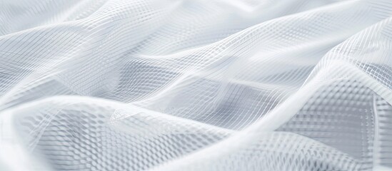 White mesh fabric background with selective focus suitable for sportswear due to its lightweight breathability and quick drying properties ideal as an abstract wallpaper with copy space image for text