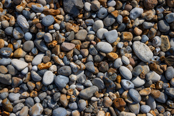 Colorful sea pebbles and rocks for natural background