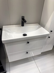 Interior of bathroom  with new modern white  ceramic wash basin sink