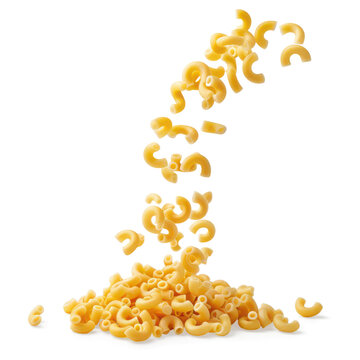Close-Up of Falling Elbow Macaroni Pasta Pieces on a Black Background.