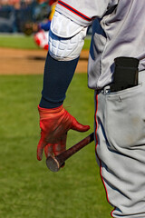 baseball player and bat closeup