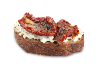 Delicious ricotta bruschetta with sun dried tomatoes isolated on white