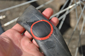 bicycle inner tube repair. patch on bicycle inner tube