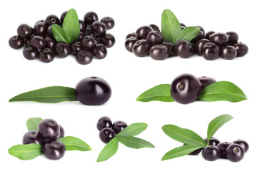 Set of acai berries with green leaves isolated on white