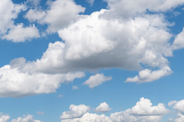 Fototapeta premium Photo of beautiful white clouds against a blue sky