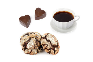Chocolate cookies in powdered sugar and Coffee in porcelain cup isolated on a white. Collage.