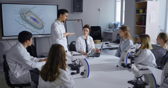 Teacher And School Students In Biology Classroom, Modern Equipment For Education, Brain Activity