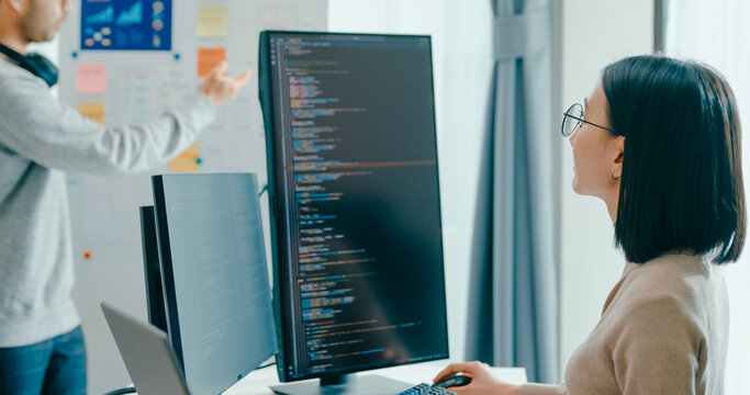 Group adult Asia male female software developers mentor leader manager talk strategy plan to executive write prompt AI bot IT app program nomad, video game, data center. Whiteboard slideshow code.