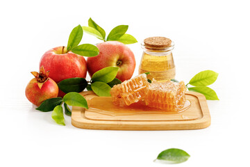 Red apples and honey on white background, traditional food of Jewish New Year - Rosh Hashanah.